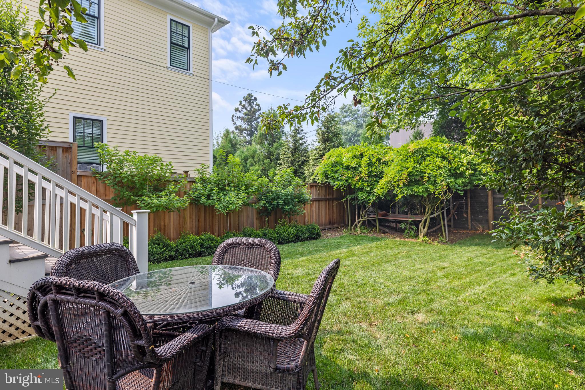 5212 MacArthur Boulevard Northwest Washington, DC 20016 - Photo 38 of 59 a view of backyard of house with seating space
