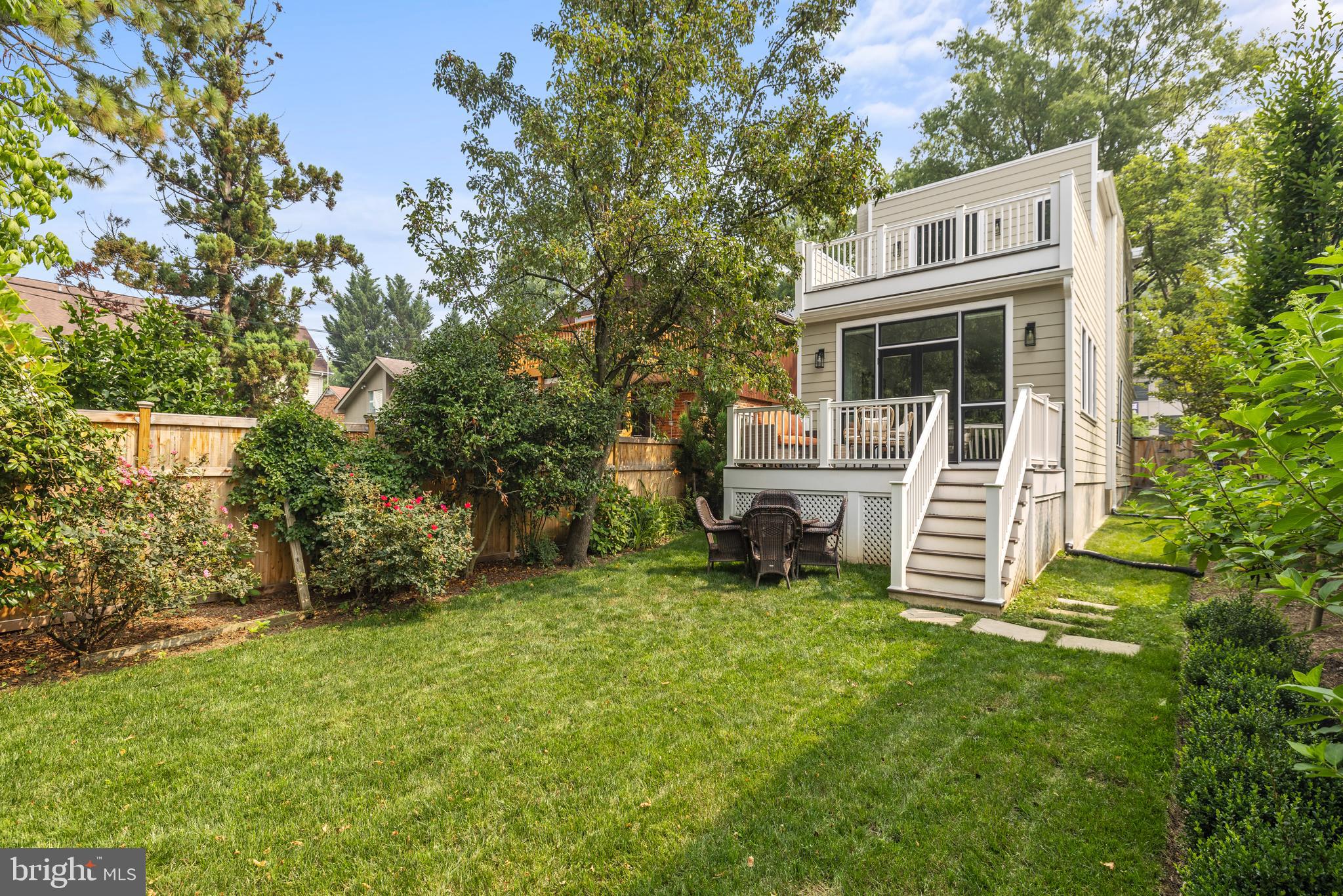 5212 MacArthur Boulevard Northwest Washington, DC 20016 - Photo 41 of 59 a view of a house with a yard