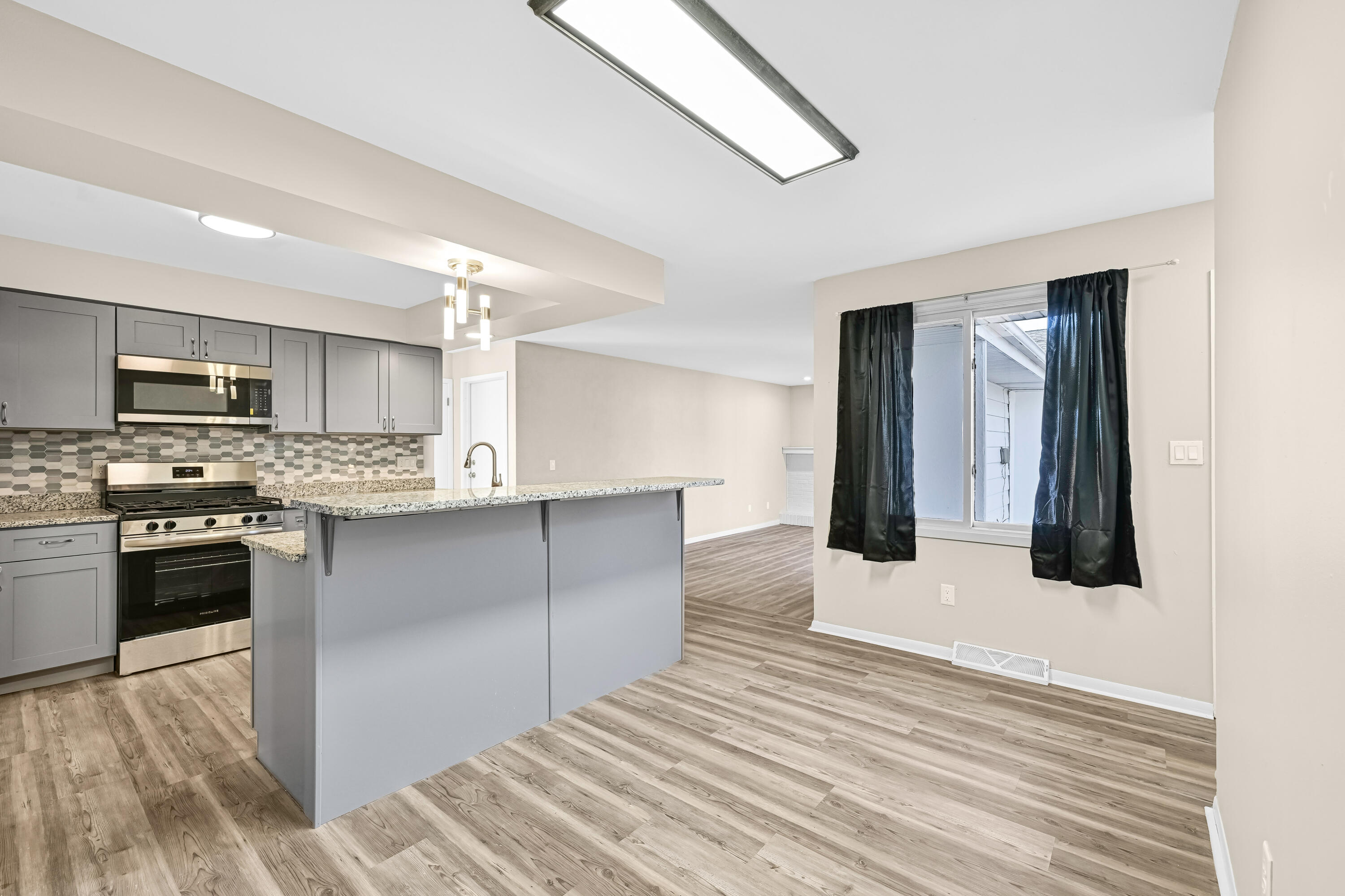 4812 Ridgeway Avenue Racine, WI 53406 - Photo 12 of 27 NEW Kitchen with NEW Flooring and room for a Table!!!