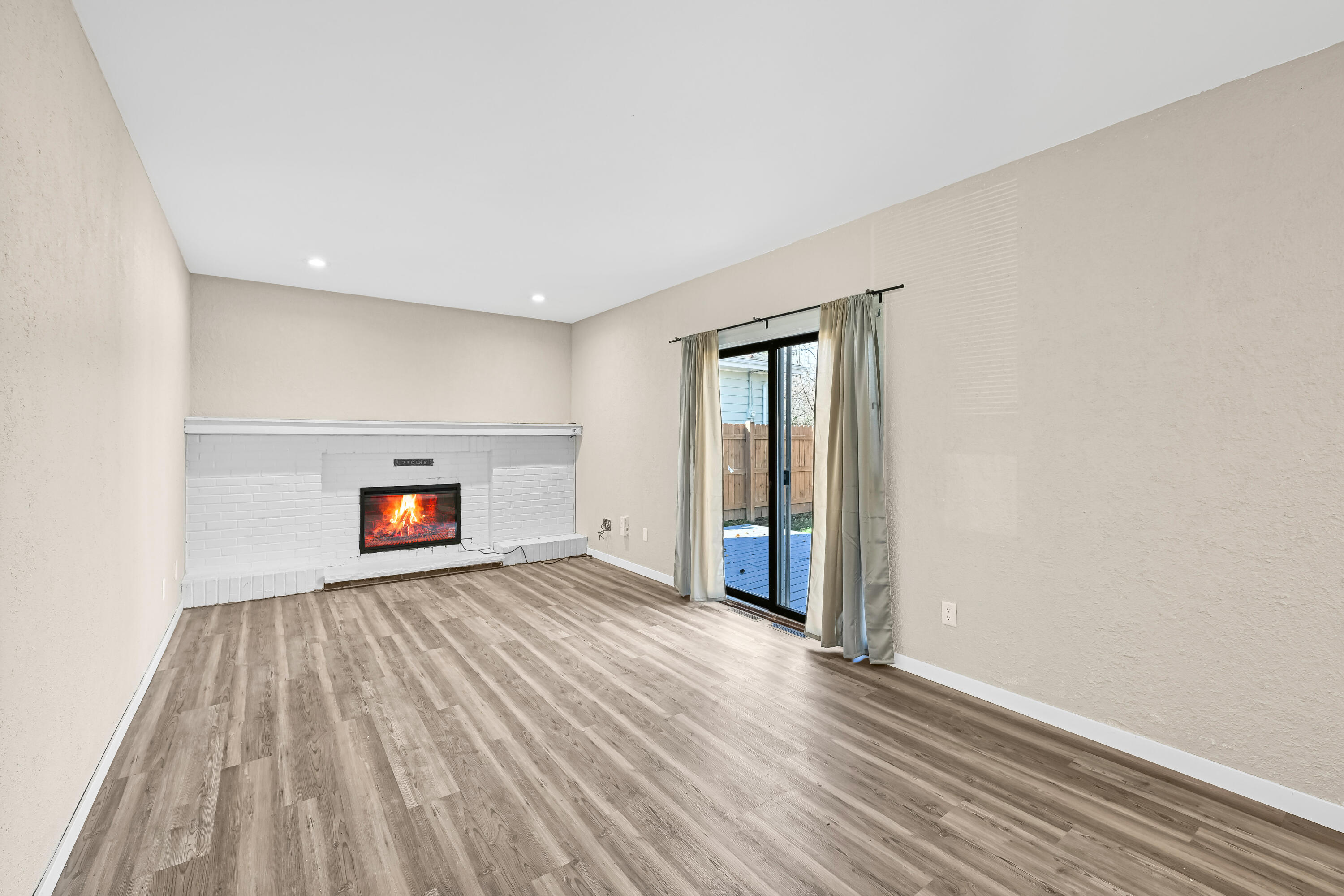 4812 Ridgeway Avenue Racine, WI 53406 - Photo 13 of 27 LARGE Family Room with NEW Electric Fireplace. NEW Flooring!!