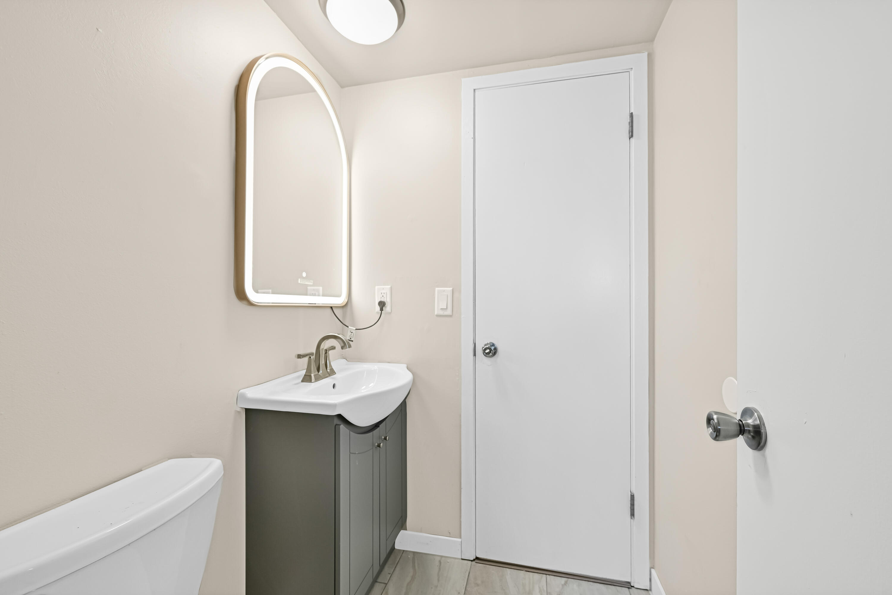 4812 Ridgeway Avenue Racine, WI 53406 - Photo 21 of 27 NEWLY Remodeled Half Bath. NEW Flooring.