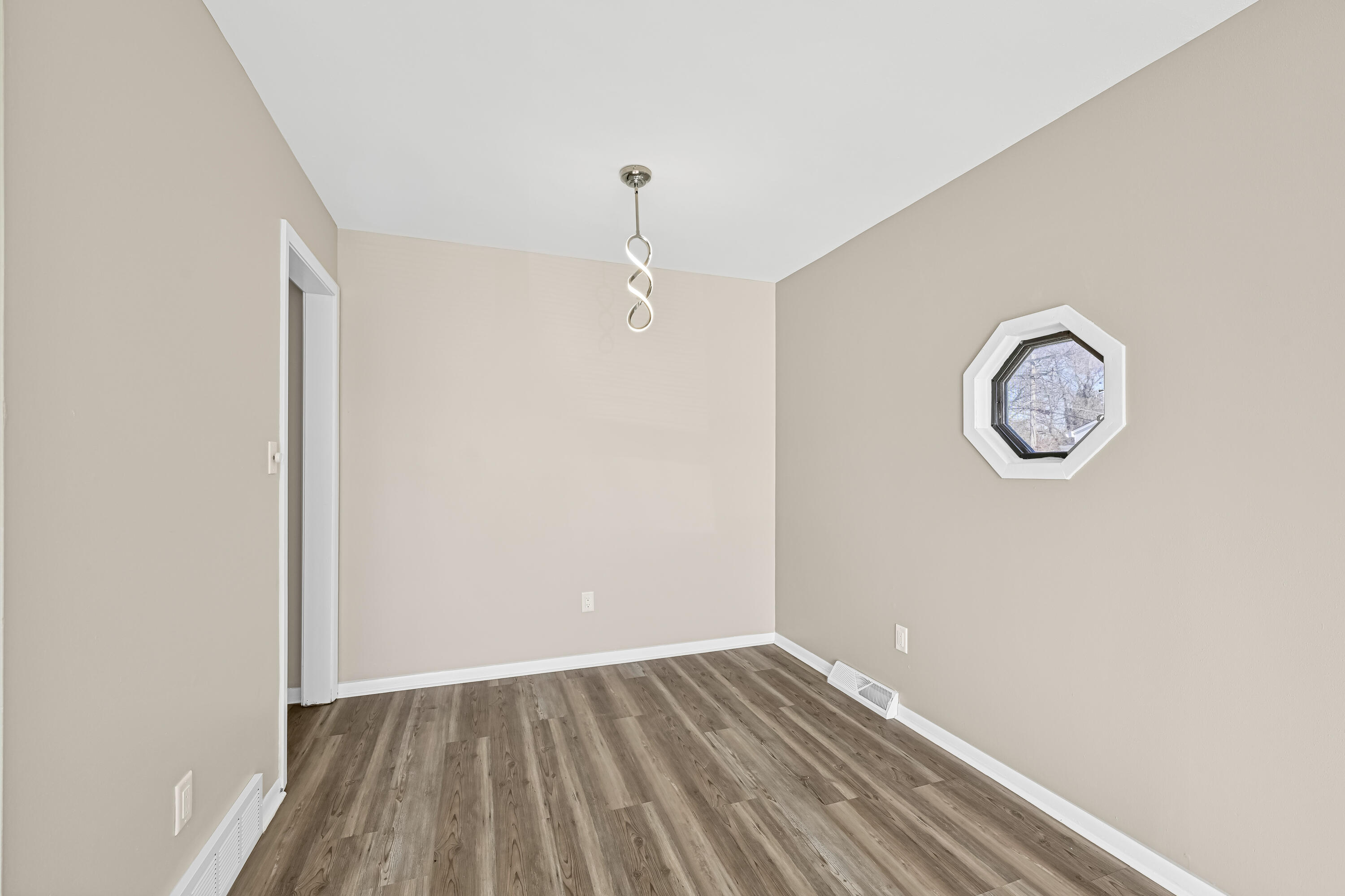 4812 Ridgeway Avenue Racine, WI 53406 - Photo 7 of 27 Dining Room with Access to Kitchen. NEW flooring.