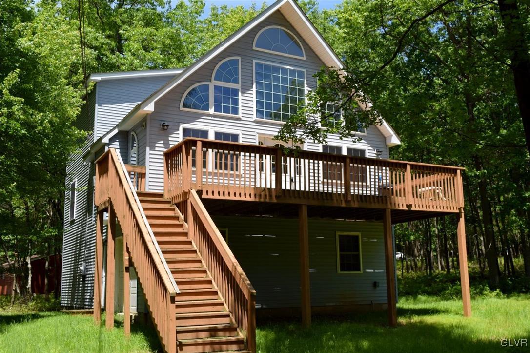 290 Brier Crest Road Blakeslee, PA 18610 - Photo 1 of 43 a front view of a house with a yard