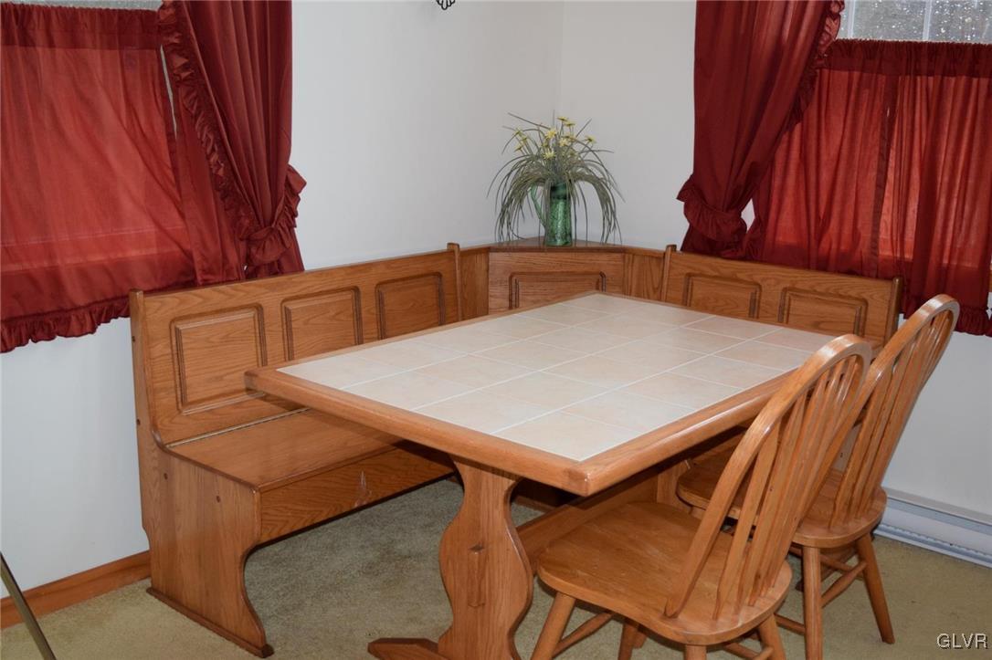 290 Brier Crest Road Blakeslee, PA 18610 - Photo 15 of 43 a view of a dining room with furniture and wooden floor