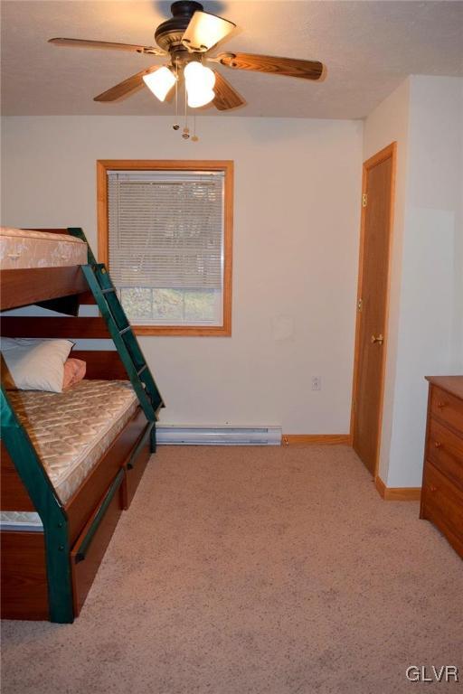290 Brier Crest Road Blakeslee, PA 18610 - Photo 32 of 43 a room with a bed and a window