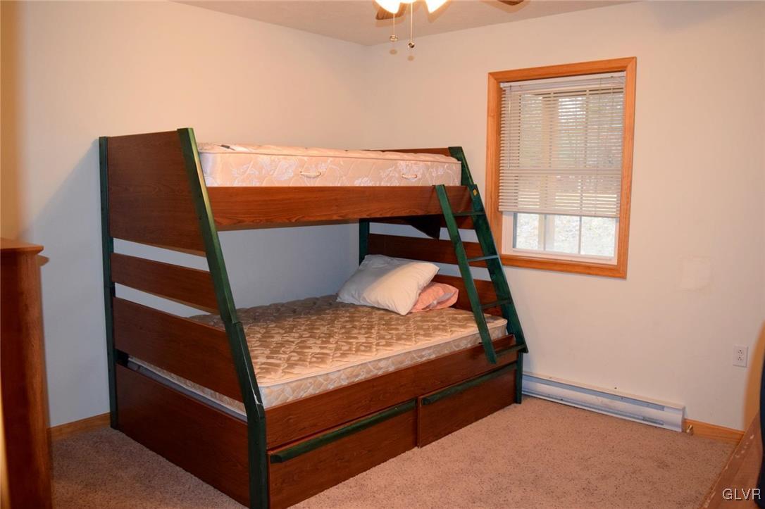 290 Brier Crest Road Blakeslee, PA 18610 - Photo 33 of 43 a bed room with a bed and a window