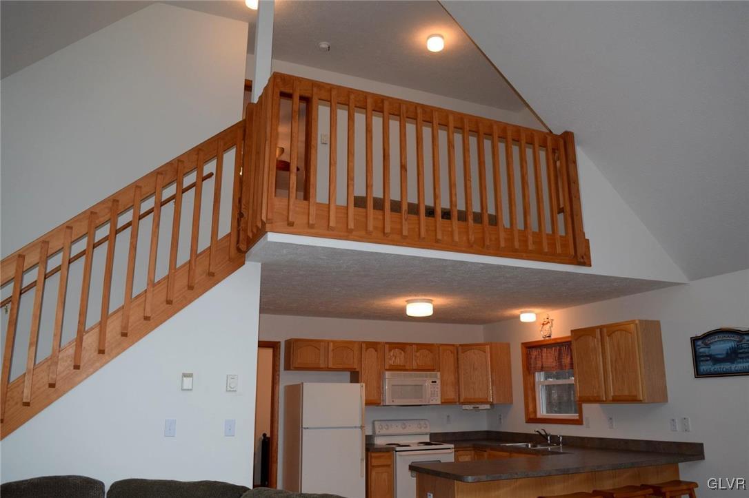 290 Brier Crest Road Blakeslee, PA 18610 - Photo 8 of 43 a view of staircase with white walls