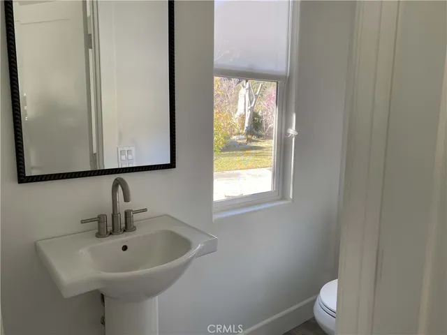 a bathroom with a sink and a toilet