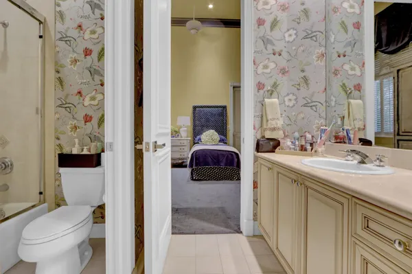 a bathroom with a bathtub and shower
