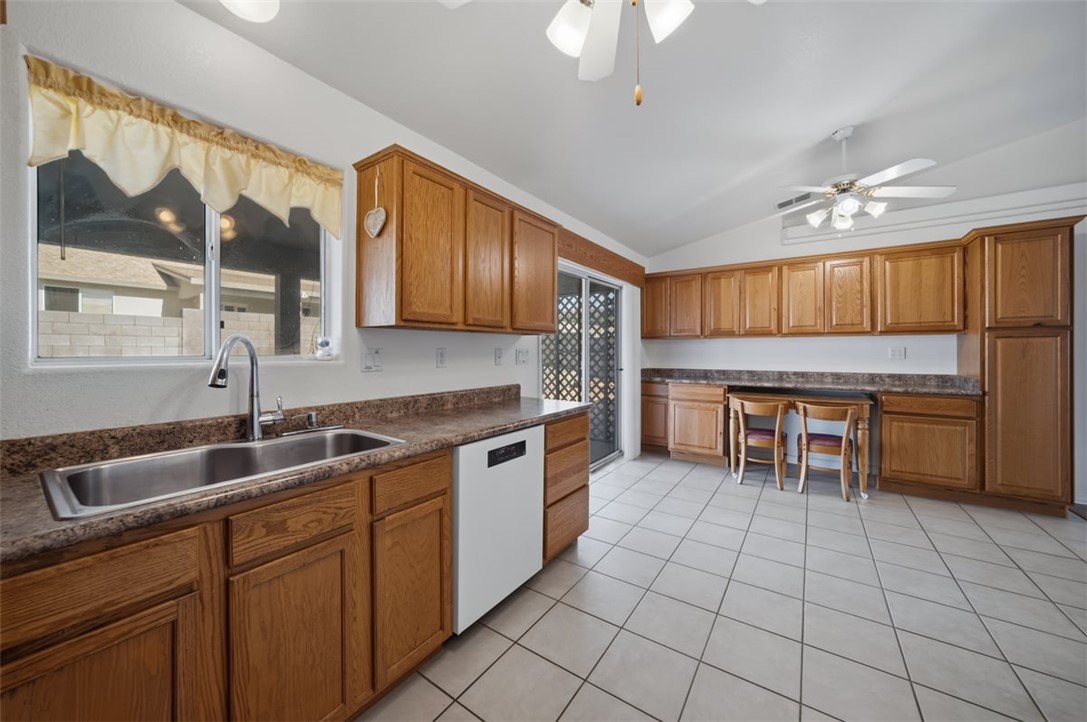 2144 Ridgeview Road Kingman, AZ 86401 - Photo 19 of 49 a kitchen with stainless steel appliances granite countertop a sink and cabinets