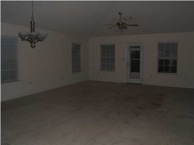 17 East Poplar Way Santa Rosa Beach, FL 32459 - Photo 5 of 9 a view of a livingroom with a chandelier fan