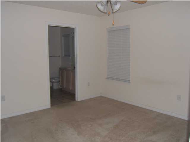 17 East Poplar Way Santa Rosa Beach, FL 32459 - Photo 6 of 9 a view of a room with a hallway