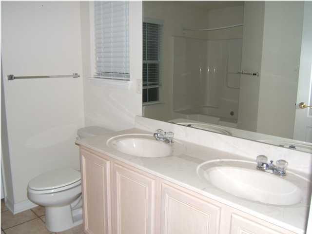 17 East Poplar Way Santa Rosa Beach, FL 32459 - Photo 7 of 9 a bathroom with a sink and a toilet