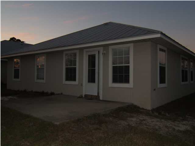 17 East Poplar Way Santa Rosa Beach, FL 32459 - Photo 8 of 9 a black house that has window in it