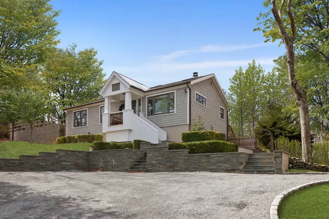 a view of a yard in front of a house