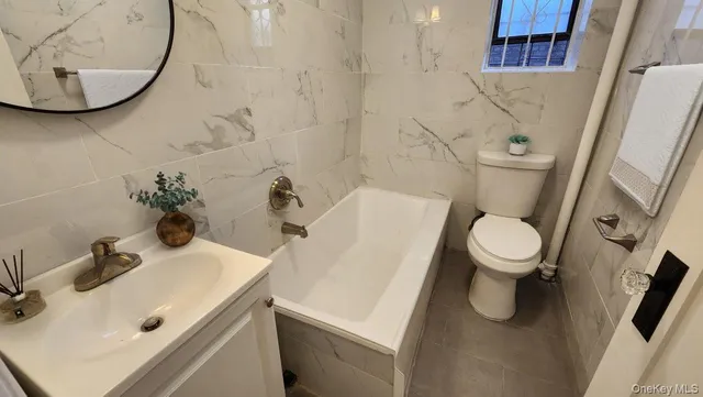 a bathroom with a sink and toilet