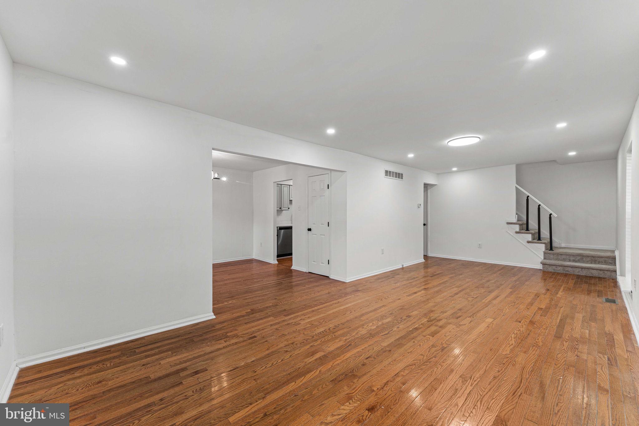 41 Zummo Way, Unit CONDO Norristown, PA 19401 - Photo 2 of 24 a view of an empty room with wooden floor