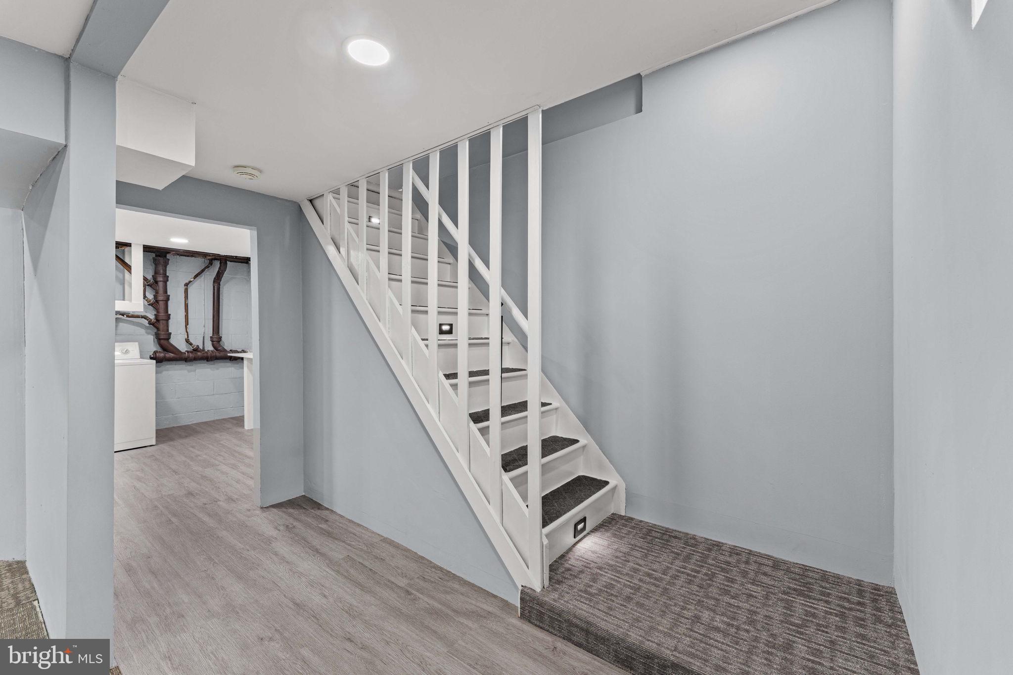 41 Zummo Way, Unit CONDO Norristown, PA 19401 - Photo 22 of 24 a view of entryway and hall with wooden floor