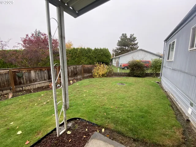 a view of a backyard with a garden