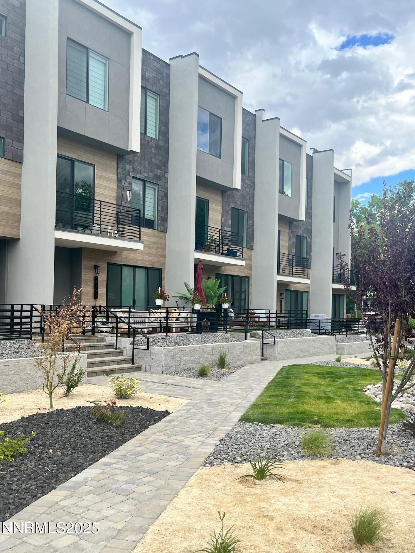 a view of a swimming pool with a lounge chairs