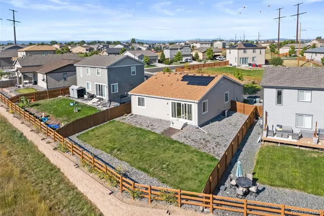 a view of a city with lawn chairs