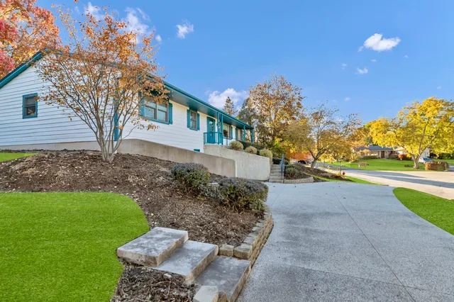 a house view with a garden space