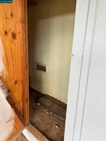 a bathroom with a granite countertop shower and a sink