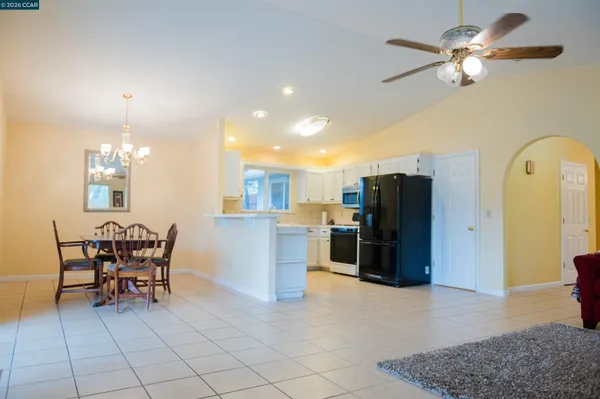 a view of a dining room with furniture