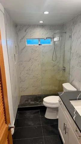 a bathroom with a sink and a toilet