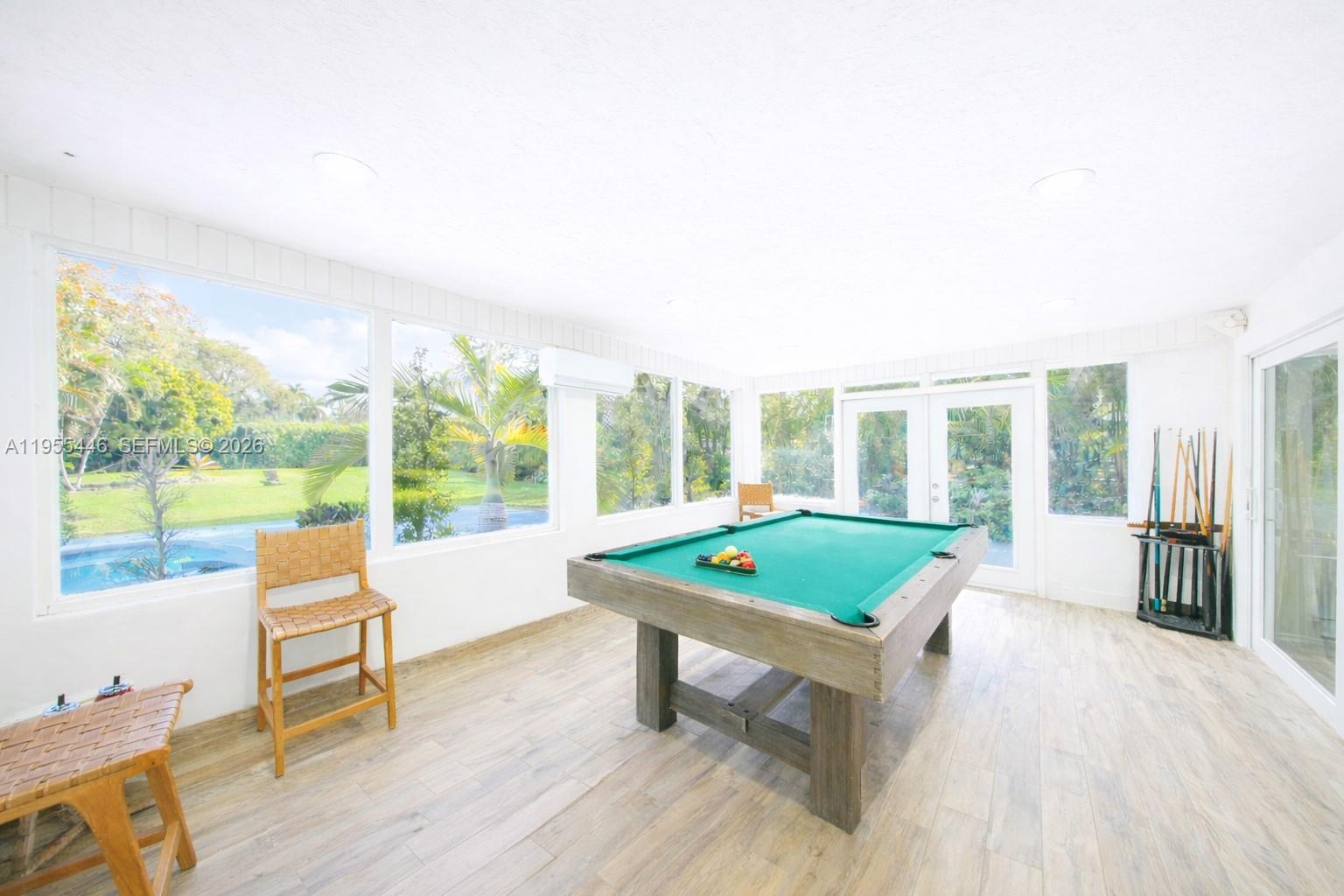 241 Southwest 129th Avenue Miami, FL 33184 - Photo 19 of 28 a living room with furniture and a large window