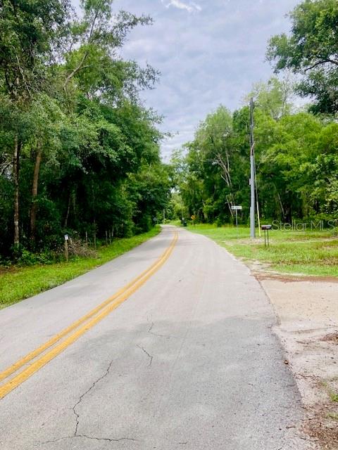 407 Raulerson Road Seville, FL 32190 - Photo 7 of 7 a view of a basketball court