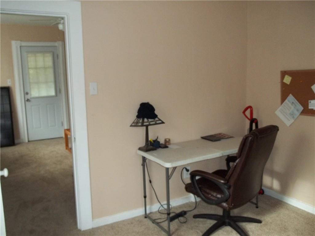 402 McCoy Road McKees Rocks, PA 15136 - Photo 6 of 20 a view of a workspace with furniture and bathroom