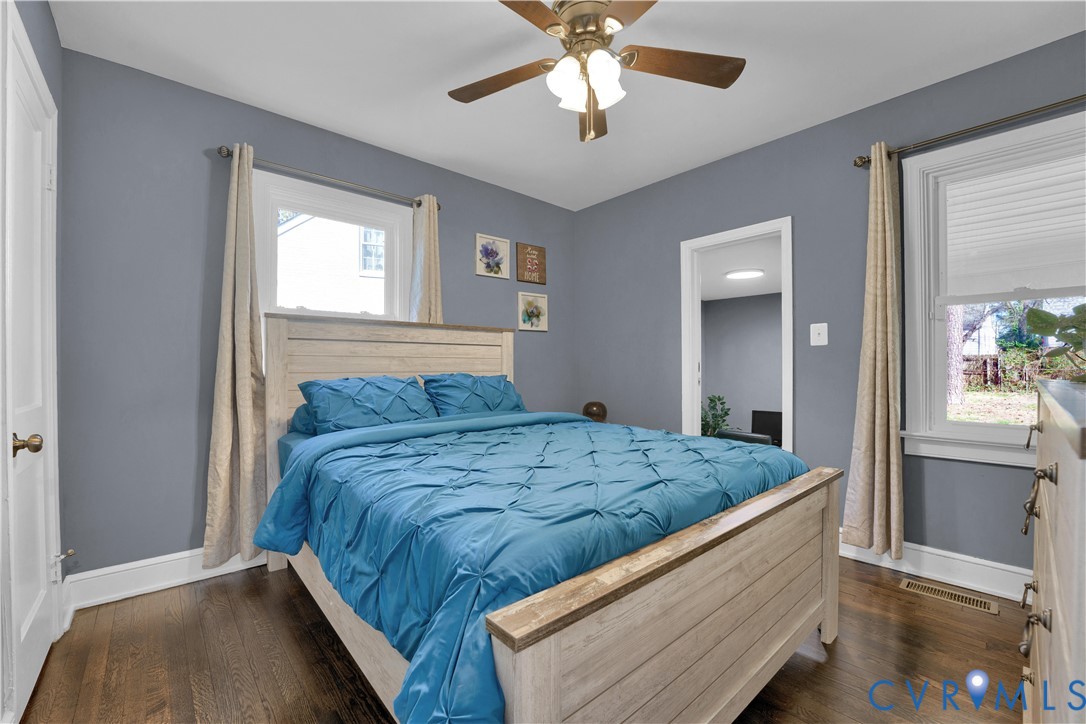 710 Hampton Road Petersburg, VA 23805 - Photo 15 of 24 Room featuring wood-finish flooring, two windows w