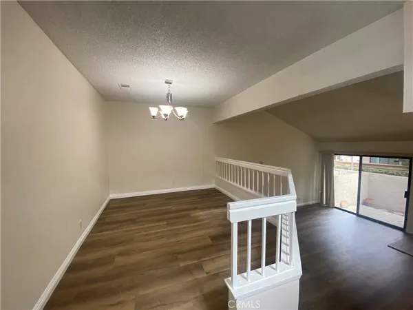 a kitchen with stainless steel appliances granite countertop a sink stove and microwave