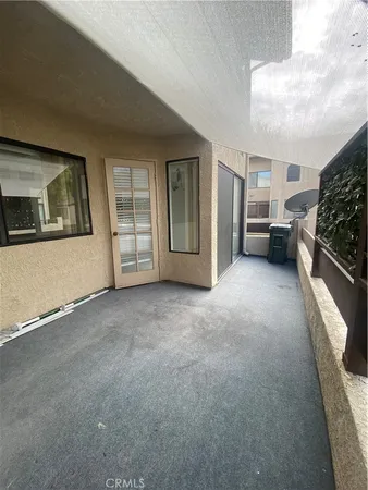 a view of an outdoor space with sitting area