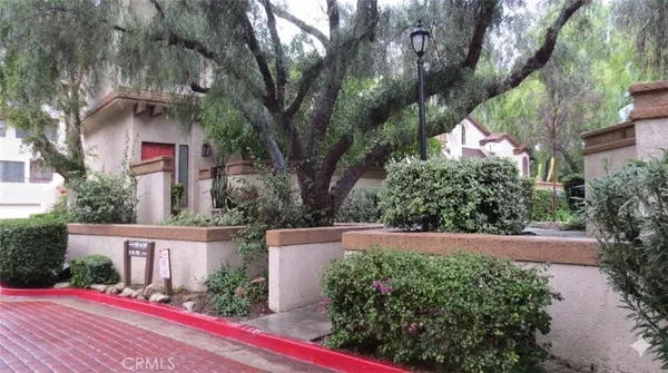 a view of a house with a street