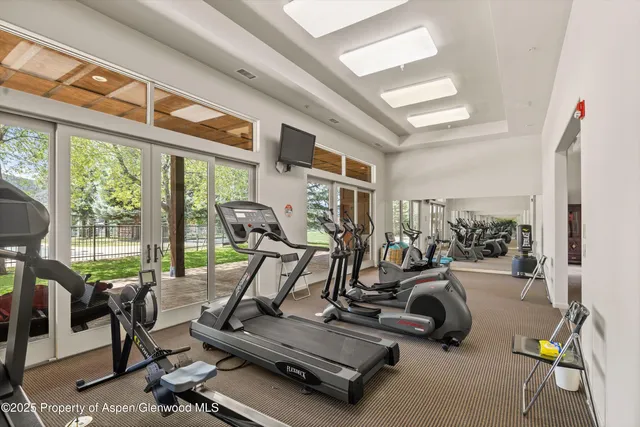 a view of a room with gym equipment