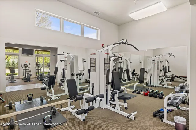 a view of a room with gym equipment