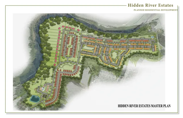 a view of a lake with beach and city