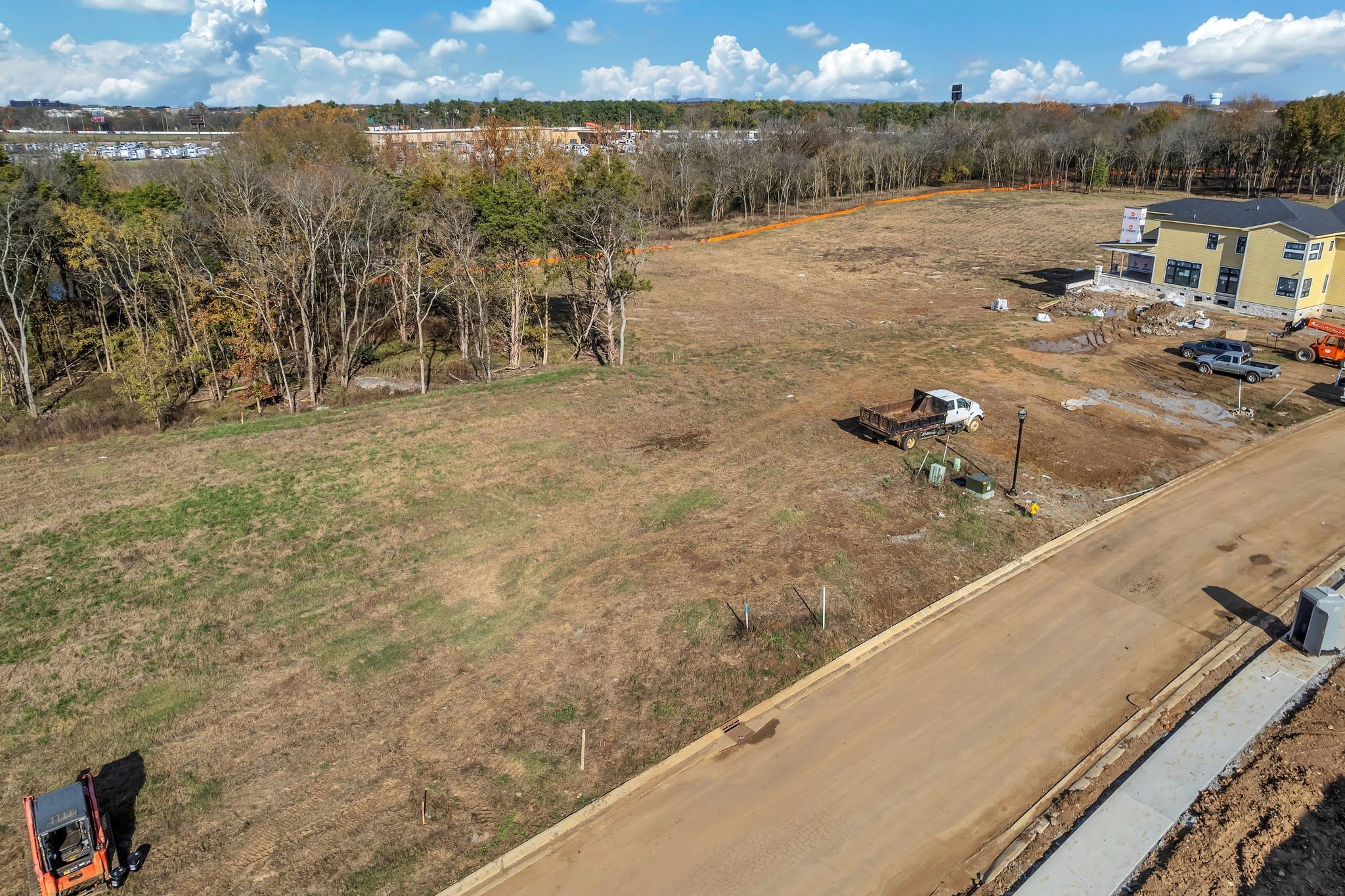 2034 Queenie Johns Drive Murfreesboro, TN 37128 - Photo 3 of 20 a view of a lake with beach and city