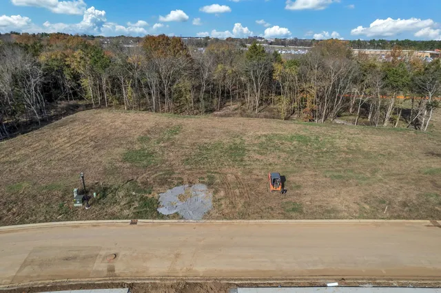 a view of a backyard of a house