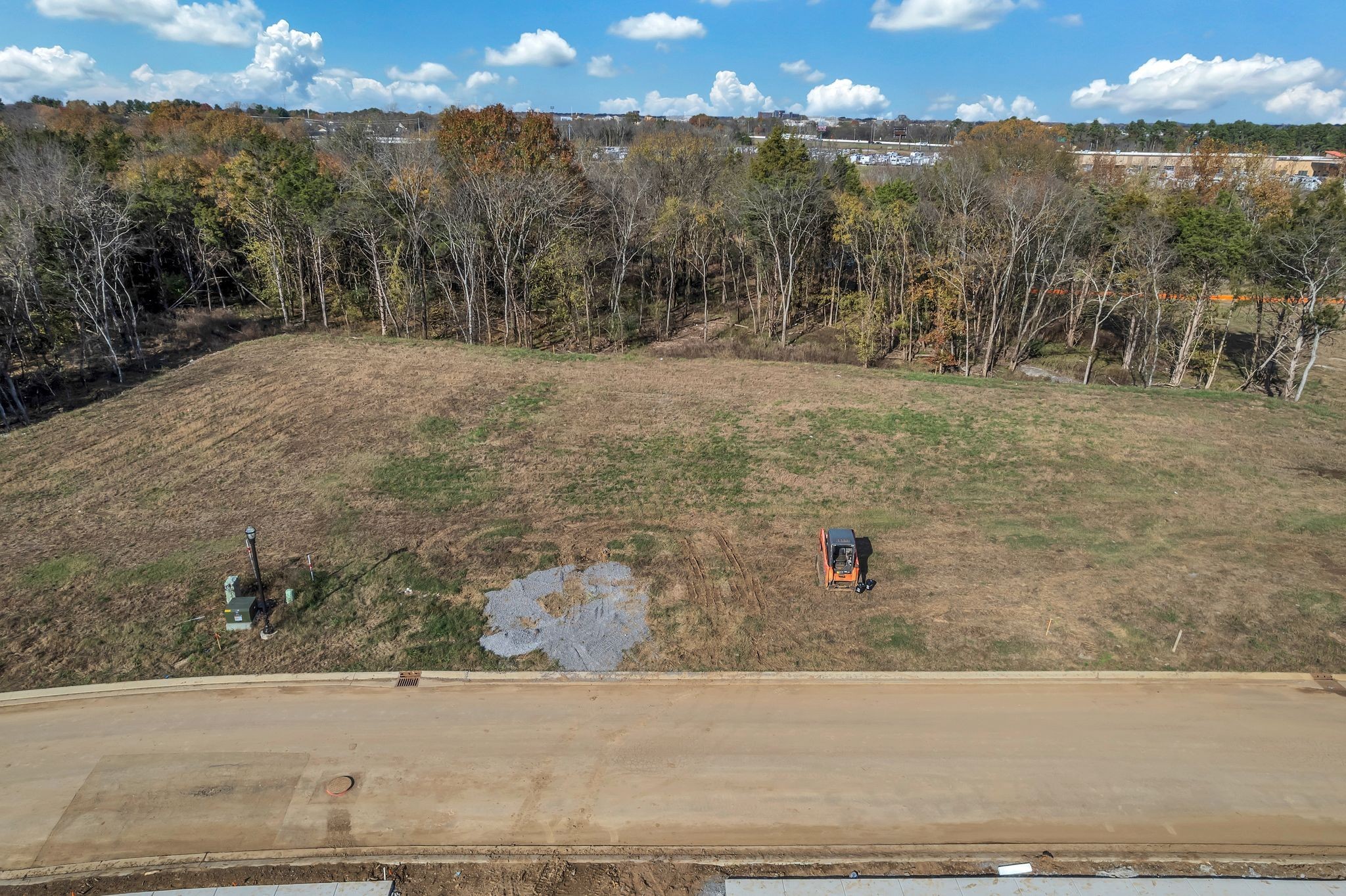 2034 Queenie Johns Drive Murfreesboro, TN 37128 - Photo 10 of 20 a view of a road with sunset