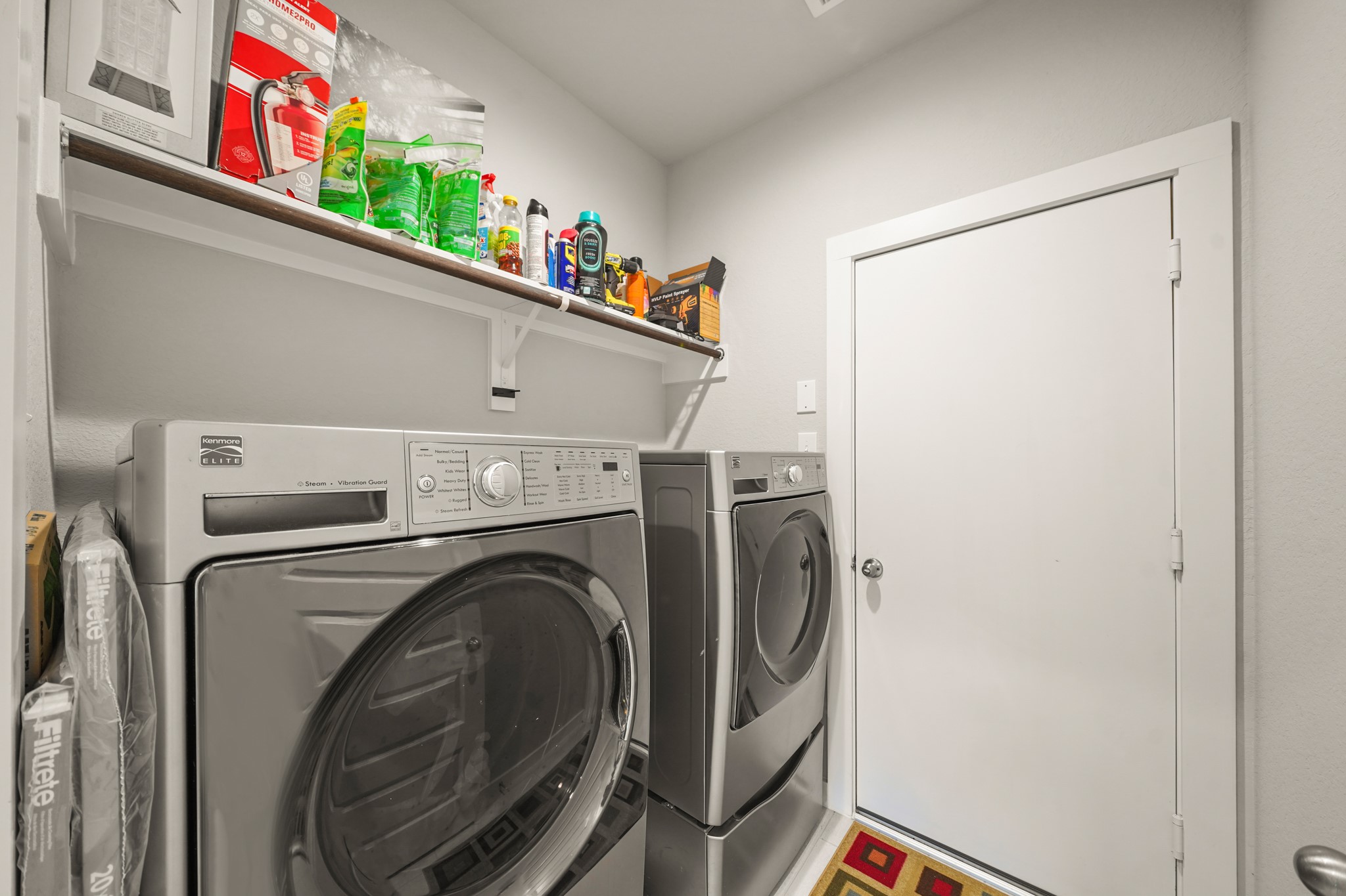18419 Windy Knl Way Houston, TX 77084 - Photo 15 of 50 a utility room with dryer and washer