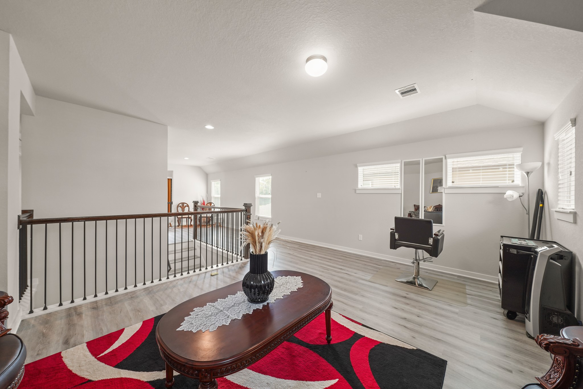 18419 Windy Knl Way Houston, TX 77084 - Photo 23 of 50 a living room with furniture and wooden floor