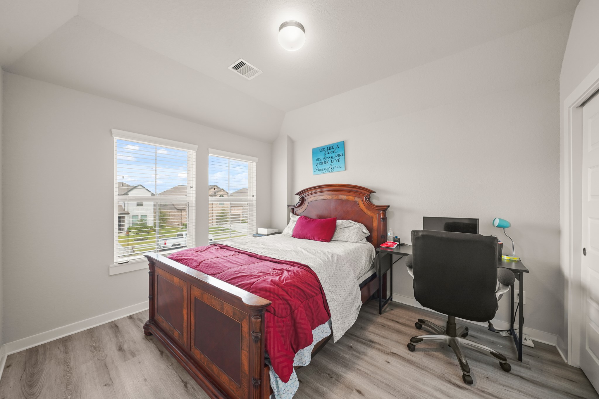 18419 Windy Knl Way Houston, TX 77084 - Photo 29 of 50 a bedroom with a bed and a window