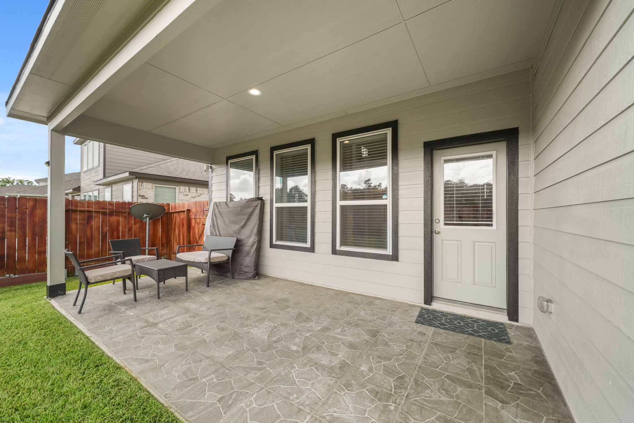 18419 Windy Knl Way Houston, TX 77084 - Photo 37 of 50 a view of a house with backyard and sitting area