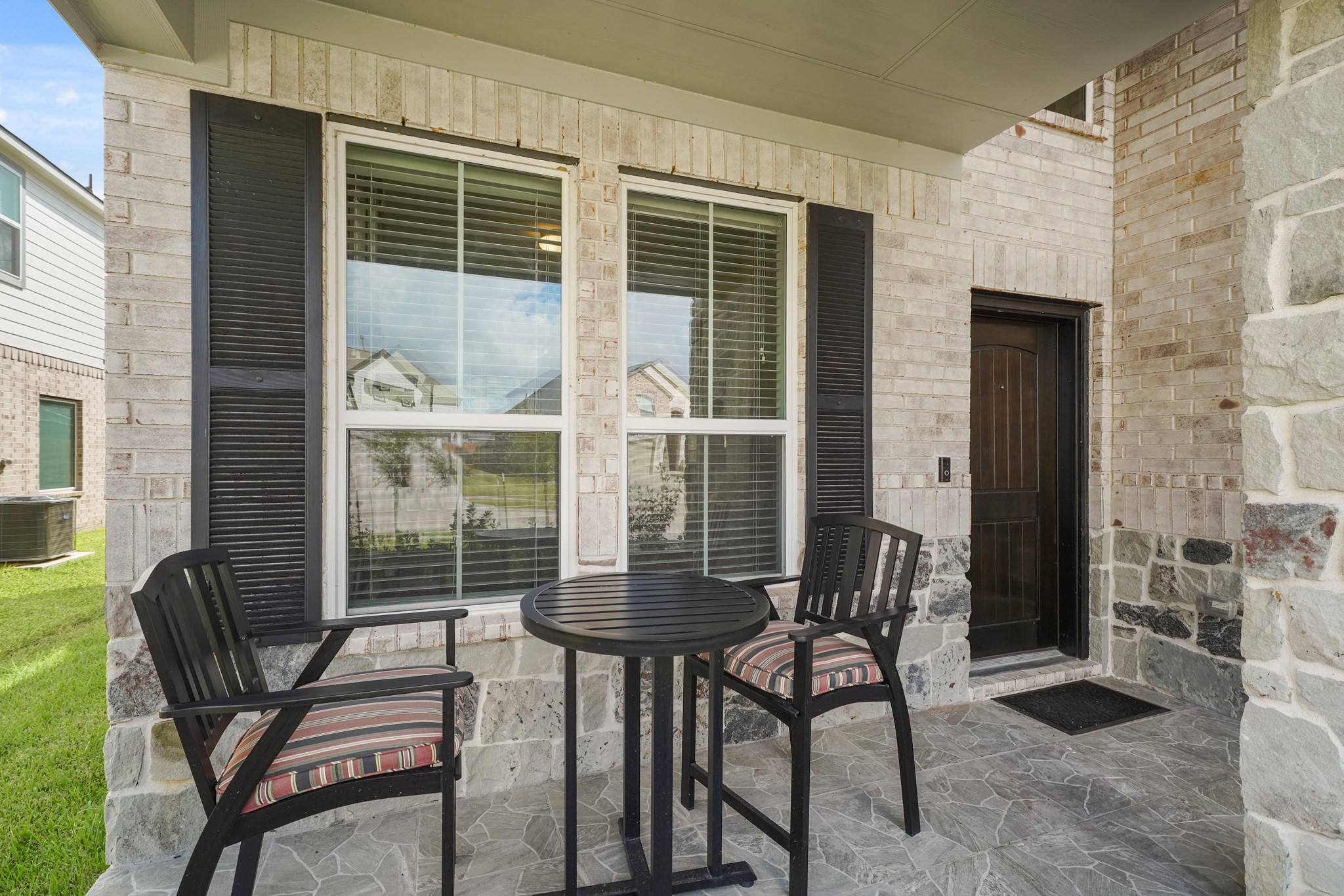 18419 Windy Knl Way Houston, TX 77084 - Photo 38 of 50 a view of a chairs and table in the patio