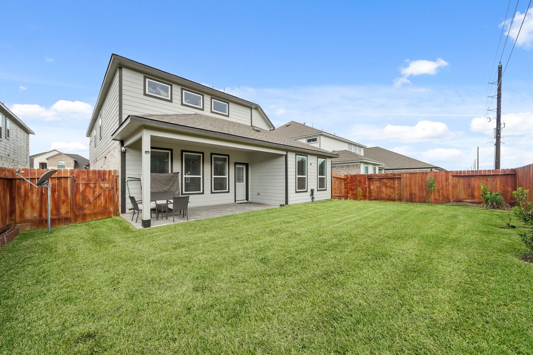 18419 Windy Knl Way Houston, TX 77084 - Photo 40 of 50 a view of a house with backyard porch and garden
