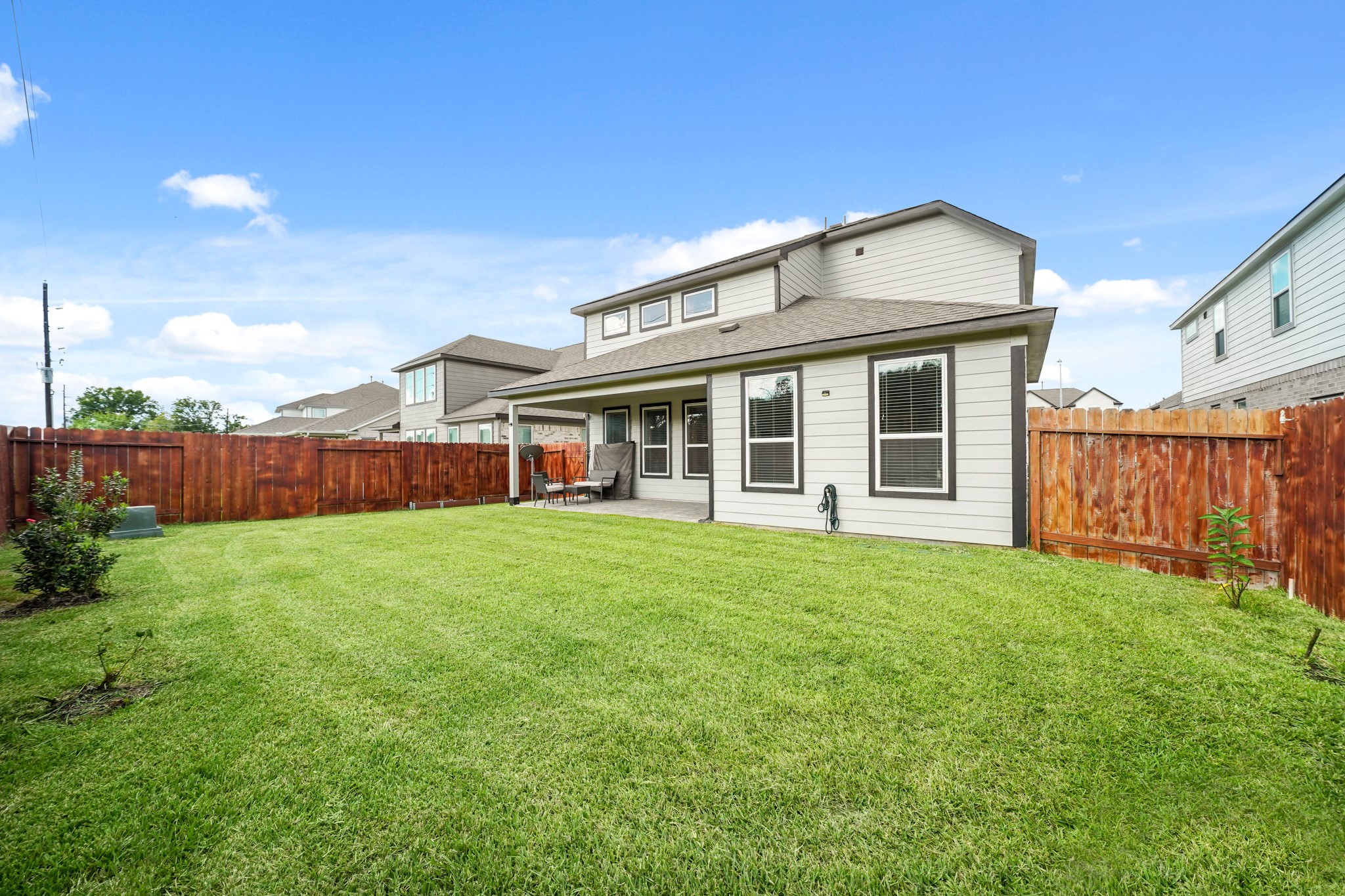 18419 Windy Knl Way Houston, TX 77084 - Photo 41 of 50 a view of a house with backyard and garden