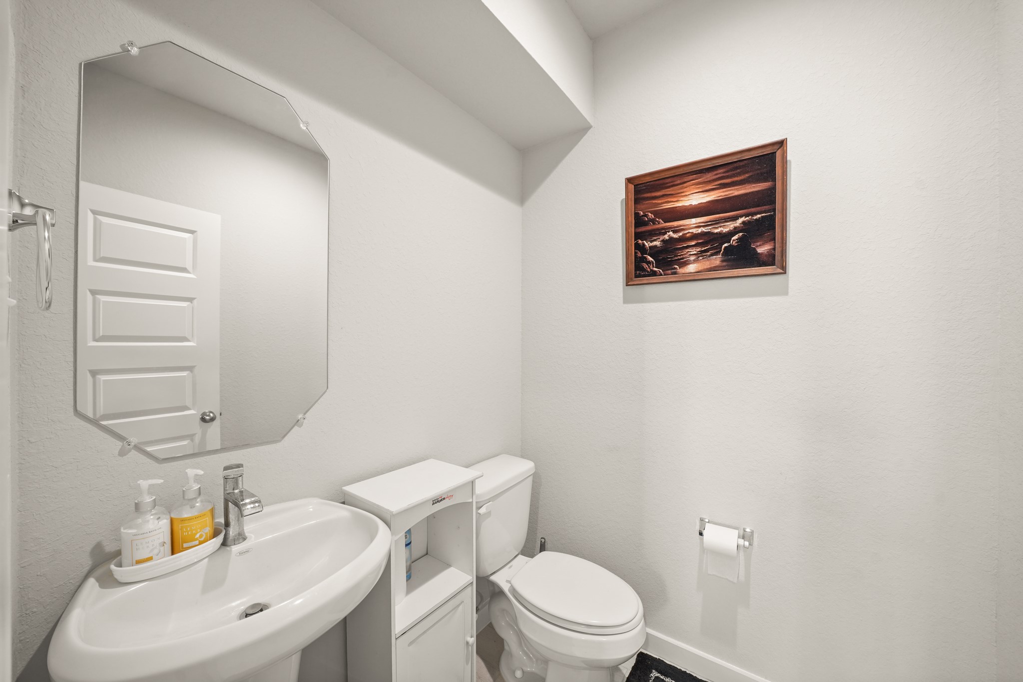 18419 Windy Knl Way Houston, TX 77084 - Photo 10 of 50 a white toilet sitting next to a bathroom sink